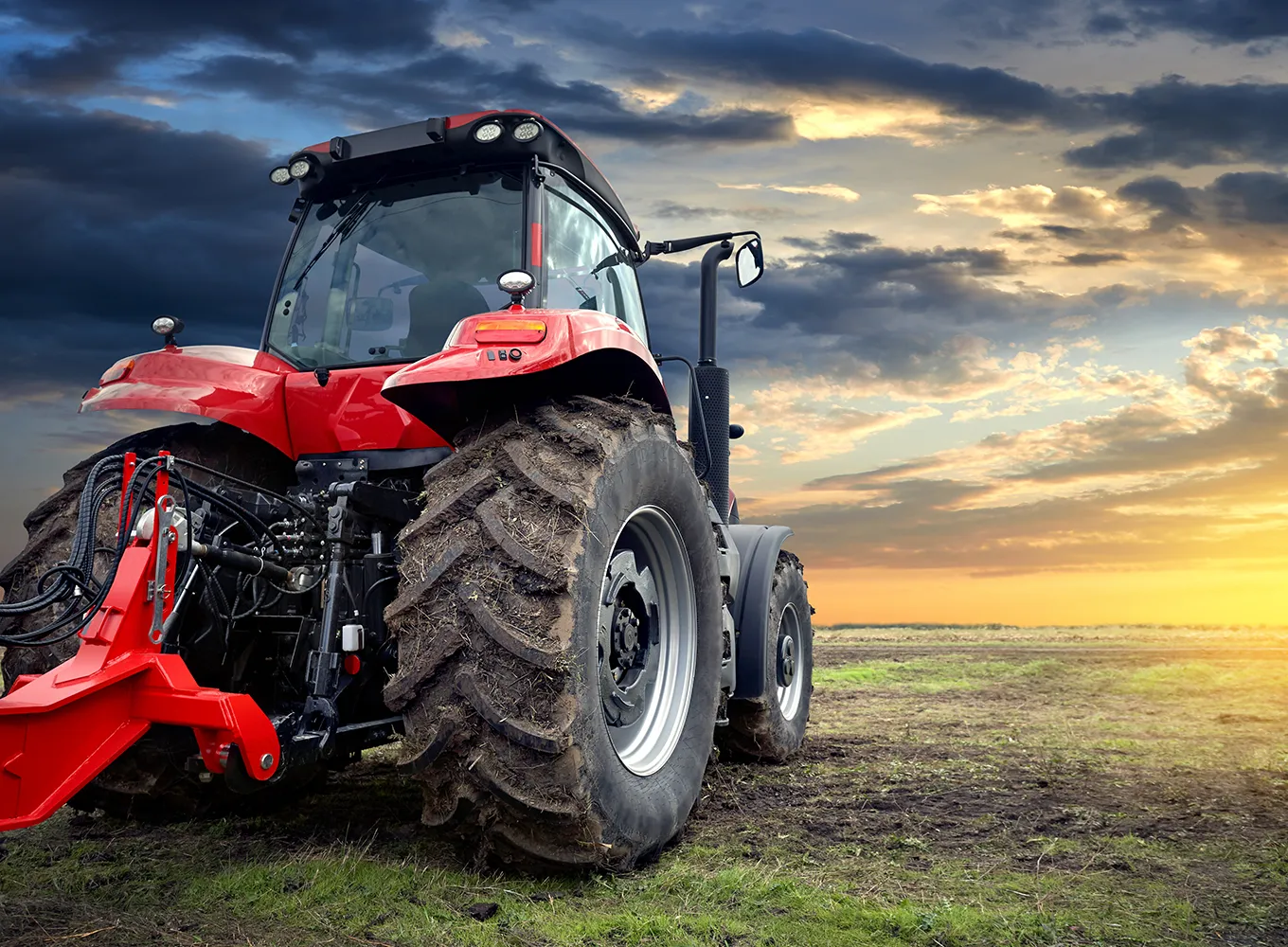 tractor on farm land, needs new tires